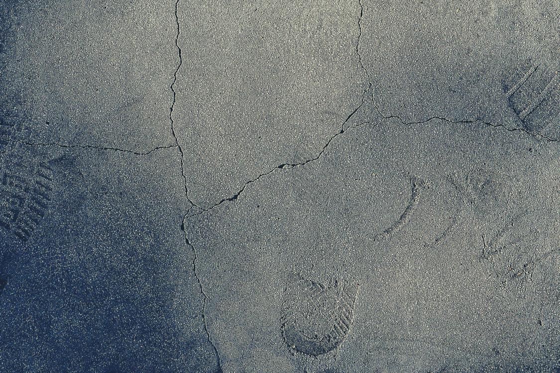 footprints on cement - The Timeless Appeal of Metallic Epoxy Floor Finishes