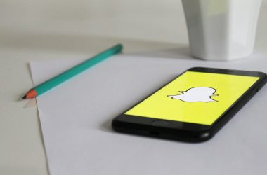 a phone and pencil over a piece of paper 380x250 - 5 Surprising Facts About Snapchat’s 'You May Know' Feature