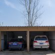 2 cars in a double garage 110x110 - The Importance of Garage Door Springs in Home Safety