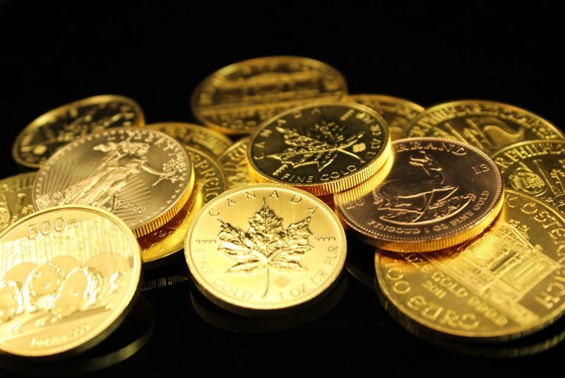 Close Up Shot of Gold Coins 800x535 - 5 Essential Rules to Know Before Buying Your First Gold