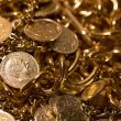 silver coins and gold chain 110x110 - What Makes Silver a Hidden Investment Gem? Explained