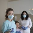 Female dentists treating teeth of patient 110x110 - What Makes IT Integration Vital for DSOs Today? Explained