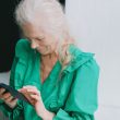 A Woman using a Smartphone 110x110 - Are Senior Phone Plans Worth the Switch? Explained