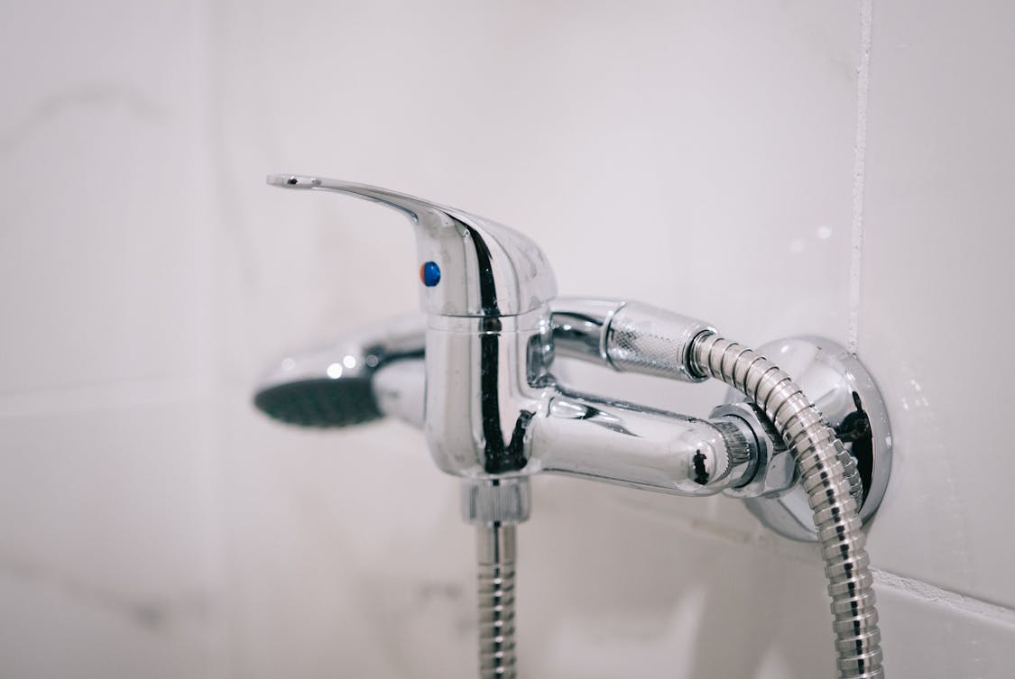Close up of Shower Faucet - 5 Benefits of Installing Off Peak Hot Water Storage