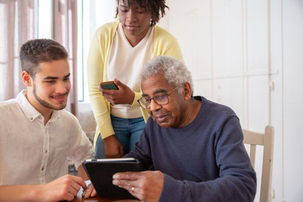 a senior man holding a tablet 1024x683 - San Diego's Dementia Forecast Is Changing How Families Plan Elder Care
